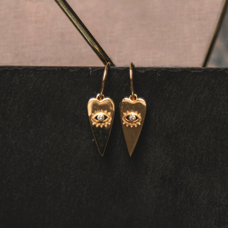 Orla Heart Drop Eye Charm Earrings | 14K Gold Plated - Luna Charles | Earrings, evil eye, eye, gold, heart, hoops, huggie, Jewellery | 