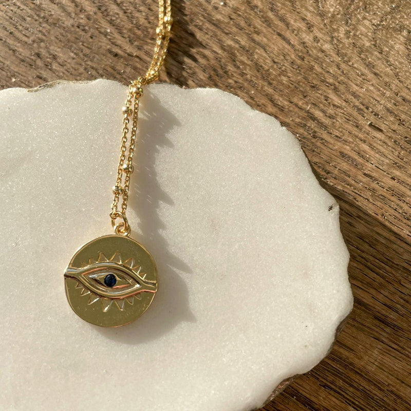 Evil eye gold on sale coin necklace